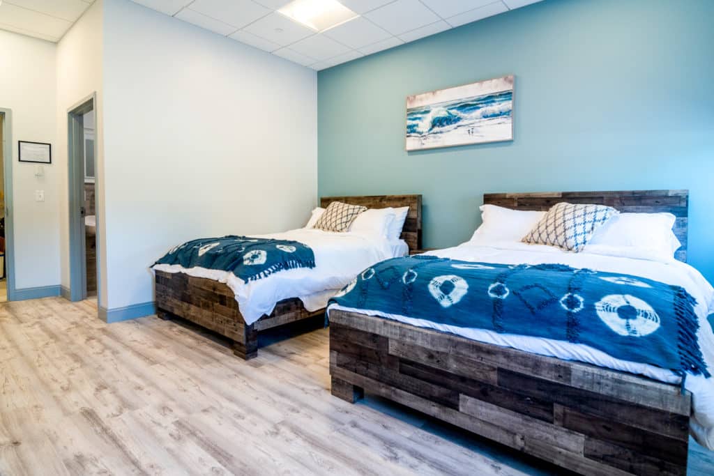 residential inpatient patient room photo with two beds 
