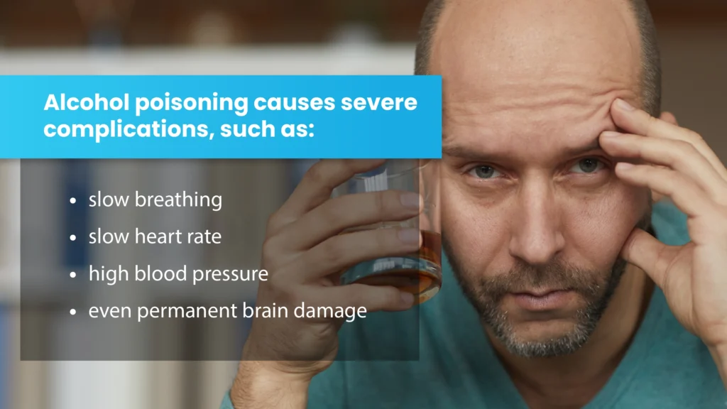 Closeup of a man staring at camera with a drink in one hand and his head in the other. Alcohol poisoning causes severe complications.
